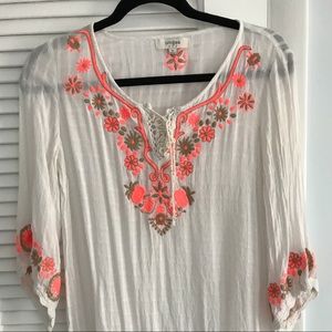 White beach coverup with embroidered details